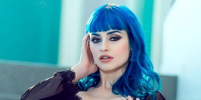Blue-haired soloing goddess Jewelz Blu demonstrates her skills