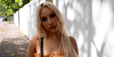 Blonde in a yellow dress Carmen Caliente gives a professional blowjob