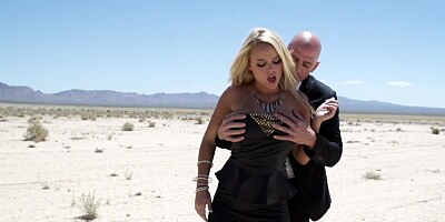 Alluring blonde gets seduced by agent in the hot desert
