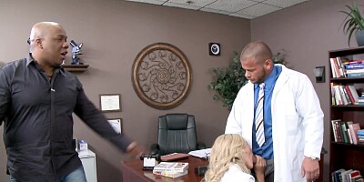 A kinky blonde is sucking the doctors dick in his office