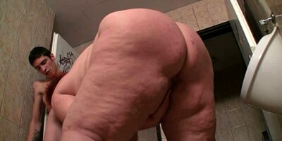 FATTYPUB - Enormous woman takes it in the public restroom