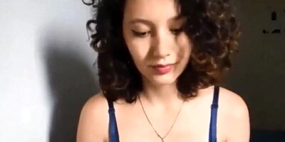 Adorable curly-haired lady is going to show you her natural tits and ass