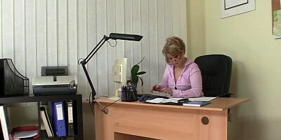 Mature blonde secretary is being fucked by her young boss
