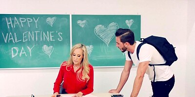 Busty blonde professor rides huge cock in the classroom of her hot and horny young student