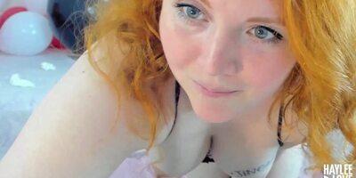 Naughty redhead is spreading les and masturbating on live webcam show