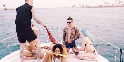 Public BDSM party with naked freakish babes on the yacht sailing in the open waters