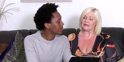 Young black guy has fun with stacked mature blonde