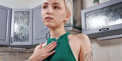 Cute pale blonde with short hair is cumming in the kitchen