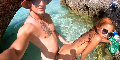Asian European amateur couple enjoying public sex on a deserted island