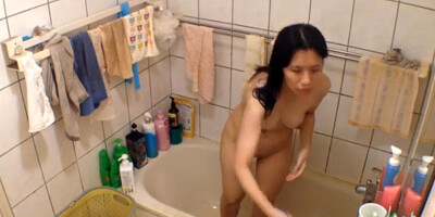 spying on Asian stepmom Wenny in the shower