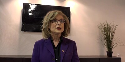 Nina Hartley knows how to handle two black dicks at the same time, in the conference room